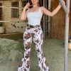 Valeria'S Boutique Cowprint High Rise Bell Bottom Jeans